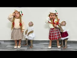 The joy of Monkey Kaka and Diem when their mother gave them new dresses