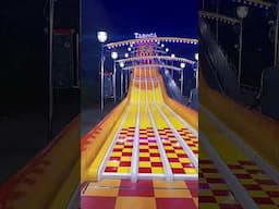 Slinky #trendingshorts ##carnival #goosefair #photography #mamamia #viralvideo #shotres #funfair