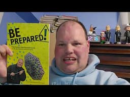 Me Holding a Copy of the Frankie MacDonald Book