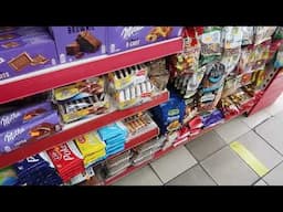 QUENTESSINTIALLY BRITISH CORNER SHOP! FREAKY CASHIER LMAO