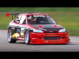 600bhp Ford Escort Cosworth attacks Slalom Course and Shoots Flames out of passenger door exhaust!
