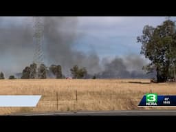 Crews mop up grass fire in Elk Grove that threatened homes