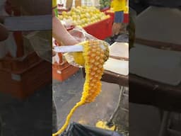 Peeling a Honey-Sweet Pineapple in One Perfect Take!