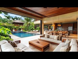 Seamless Indoor Outdoor Living Room with Tropical Elegance Luxurious Poolside Comfort