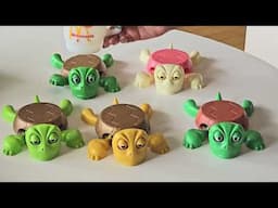 亀コースターにカップをおく-ケータイ Watch