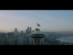 Microsoft flag flies atop Space Needle to celebrate company’s 50th anniversary
