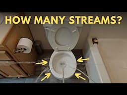How many people need to cross-streams to flush a toilet?