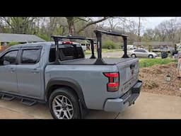 Truxedo Elevate adjustable Bed Rack installed Nissan Frontier with T-slots BAK Revolver cover