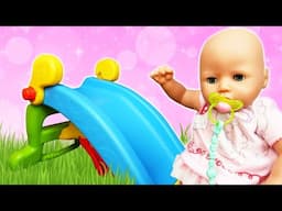 Baby Annabell doll got bored with her baby toys and tried a toy slide for kids.