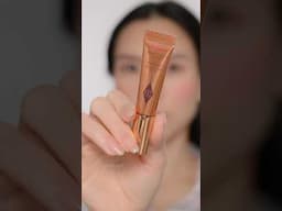 Achieve a radiant,lit-from-within glow with Charlotte Tilbury Glowgasm Beauty Light Wand - Spotlight