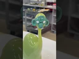 Hot Glass Team creates a dinosaur with one of Daniel Coyle’s signature monkey heads 🦕🐵 #glassart