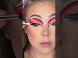 funky graphic eyeshadow look 🩷🧡 #makeup