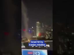Israeli citizens react as Iranian missiles strike Tel Aviv
