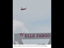Wells Fargo logo lifted onto Charlotte skyscraper