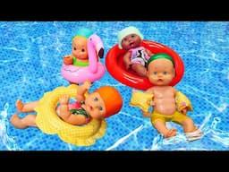 Baby dolls go to the swimming pool! New swimsuits and floating toys for baby born dolls.