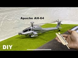 The process of making a miniature model of the Apache AH-64 helicopter