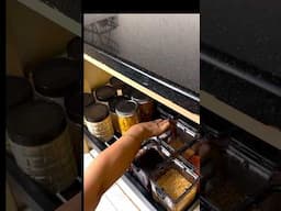 The simple solution is a pull-out cabinet organizer for messy kitchen!Credits: @chaukhat__ #kitchen