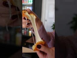 this Korean donut cheese pull has never been stretchier