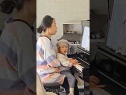Me and my darling son playing piano in our church.