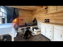A Man Built a Log House in the Forest and Lives in It