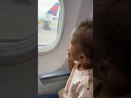 The way her eyes light up when she sees a plane..