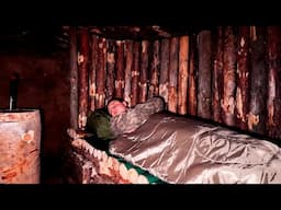 Building a warm dugout in the wild forest, forest cooking