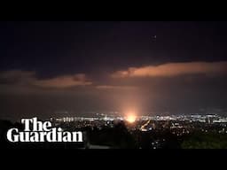 Moment apparent projectile hits Haifa in Israel on third night of conflict with Iran
