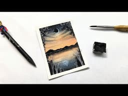 Cosmic watercolor night sky over lake painting tutorial » How to paint magical clouds for beginners