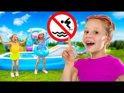 O pai de Nastya mostra às crianças as regras de segurança na piscina