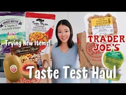 Trying NEW at Trader Joe's taste test haul! pineapple teriyaki chicken meatball, tom yum snack &more
