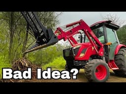 Tree Puller On a Compact Tractor