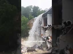 Flood waters pour through West Virginia apartment, tears off wall