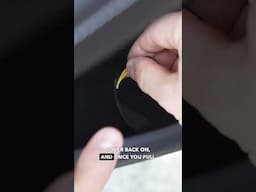 EMERGENCY door release in the rear of the Tesla Model Y