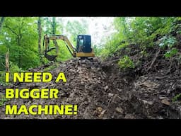 Digging Steep Hillside Road Through Rock - Caterpillar Excavator