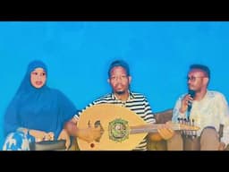 QaaciHasan laki iyo  xusuusti Aun cumar dhule