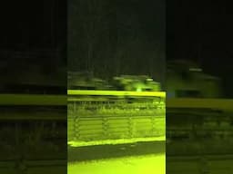 Military train filmed with night vision camera.