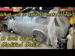 Getting my Malibu wagon running again after sitting for 14 years in the corner of the garage.