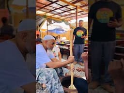 black american learning how to pound fufu