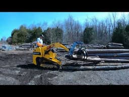 BAUMALIGHT TRL630D WITH LMH316G GRAPPLE MOVING LOGS