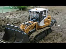 Liebherr 636 pushing soil at the landfill