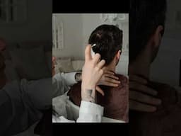 Spray bottles test on his hair