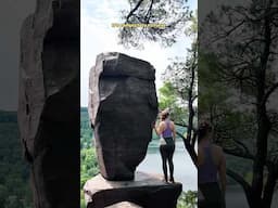 How is this giant rock balancing on a cliff?