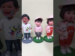 Unstoppable Joy with Handmade Clay Bobbleheads Swaying Together
