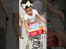 1yr old doing Laundry-This is how independence starts-little hands trying, learning, & feeling proud