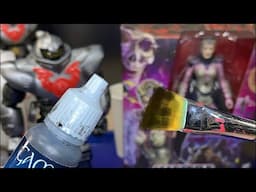 Black washing to make it look like metal, or more detailed. He-Man action figures paint demo