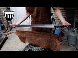Forging a teardrop Damascus longsword, the complete movie.