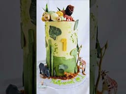 Decorate a safari cake with me in 20 seconds. 🍃🌿🍂🦒🐅🐆#safaricake #junglecake #cakedesign #cakedecor