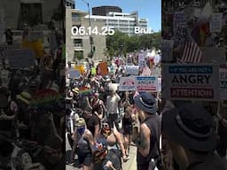 Thousands of people march at the anti-Trump "No Kings" protest in Denver