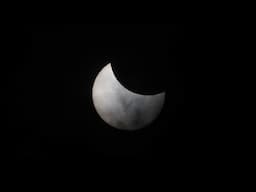 Taping a small ND filter on a BIG photographic lens for a solar eclipse