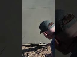 Mastering how to strip it wet. #concretesolutions #drivewaydesign #concrete